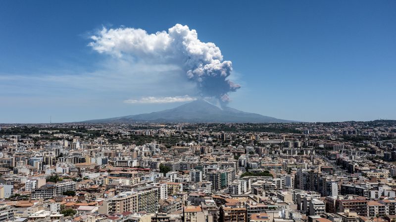 Mount Etna's Explosive Eruption: Ash And Rock Soar
